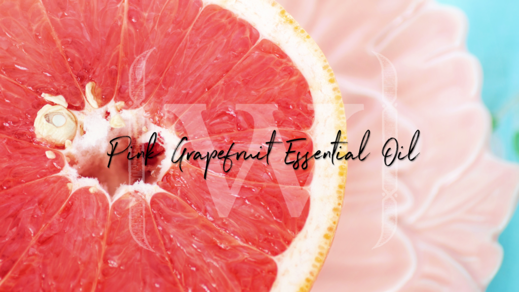 Pink grapefruit with text over the top that reads "Pink grapefruit essential oil".